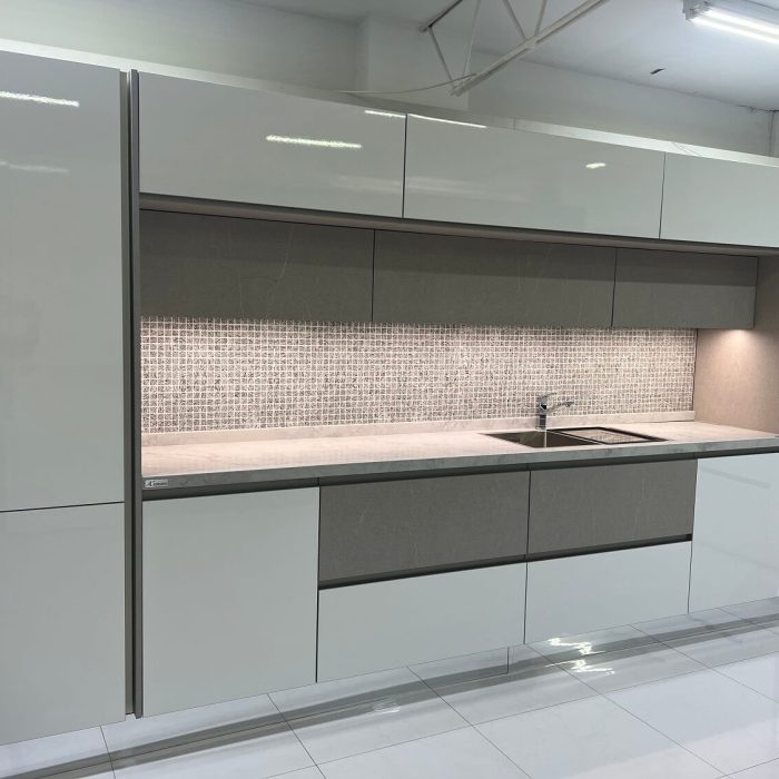 Glossy White Kitchen with Mosaic Tile Splashback