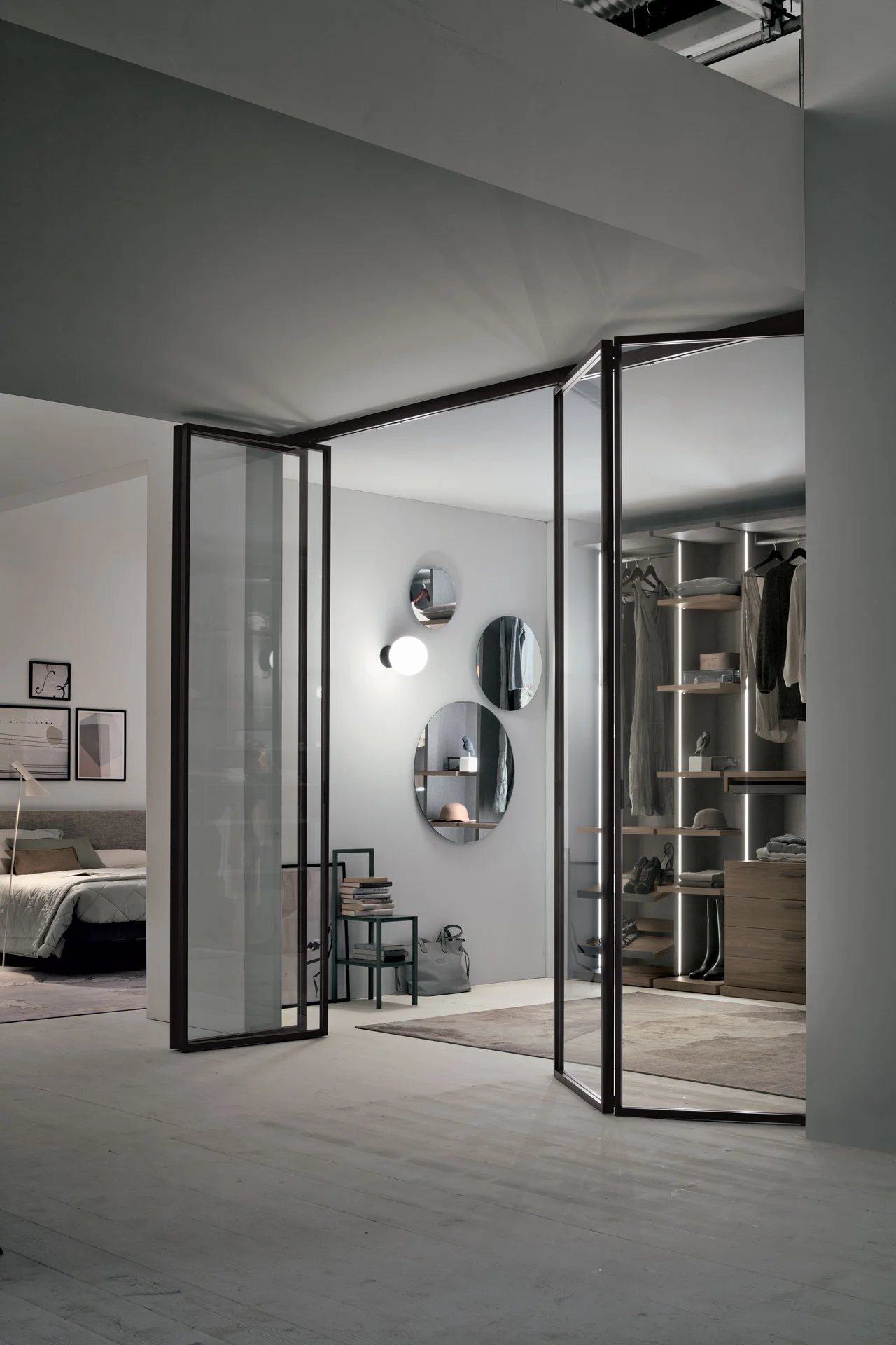 TOMASELLA closet system with glass doors and walk-in wardrobe access