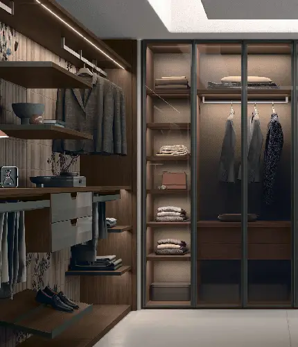 TOMASELLA Pratico walk-in wardrobe with glass doors, open shelving and warm lighting
