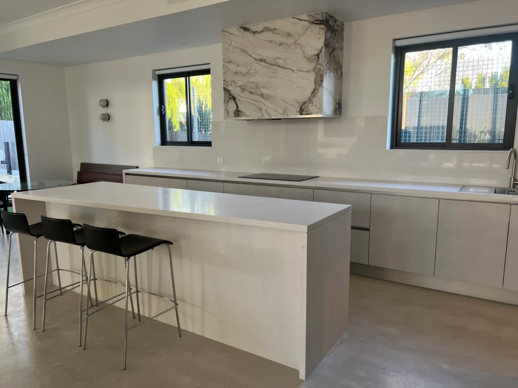 custom-white-kitchen-island-handleless-cabinetry